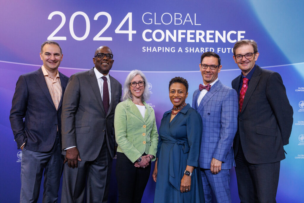 A photo of the panellists at Milken Institute Global Conference